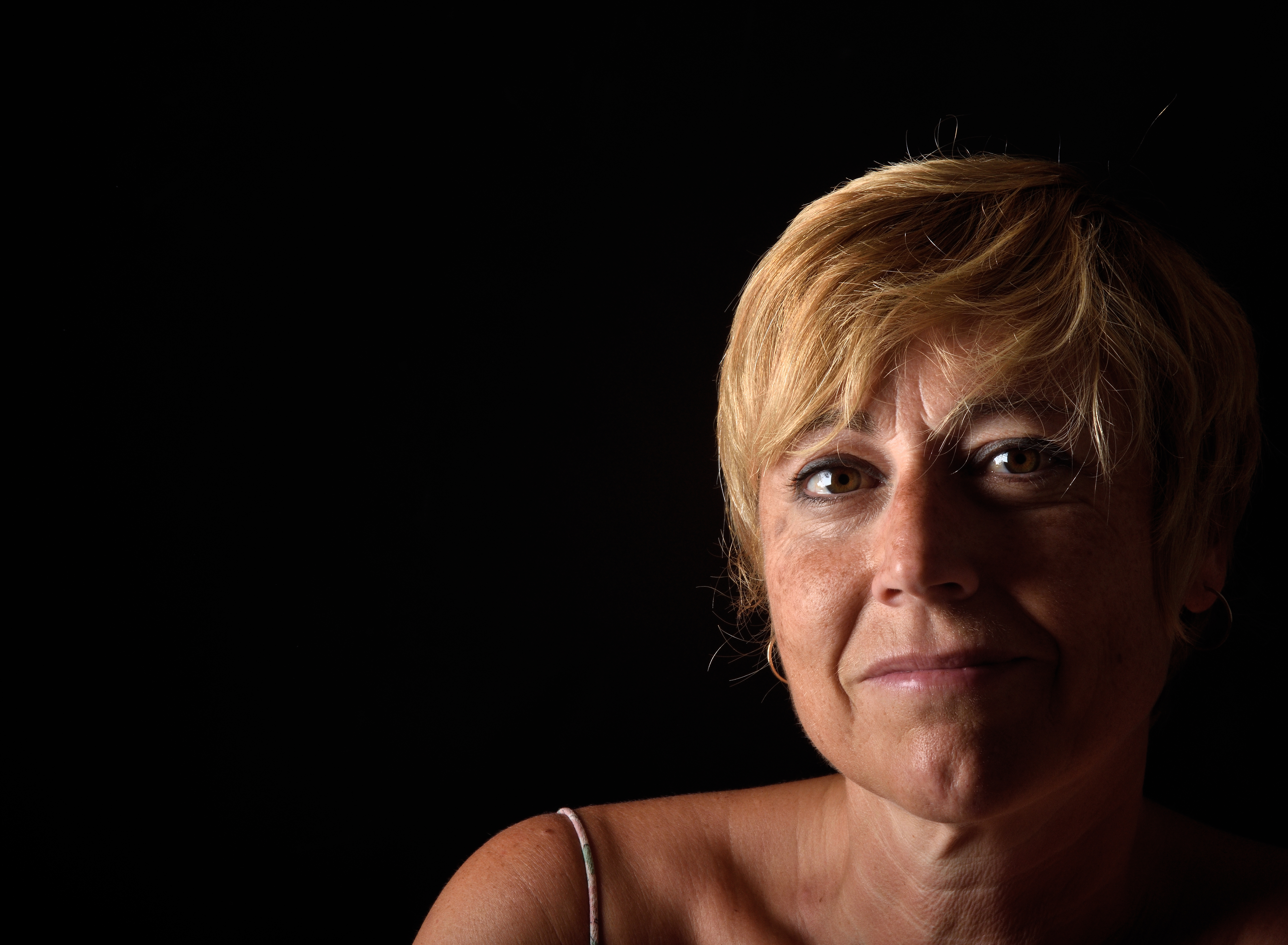 A woman with sunspots